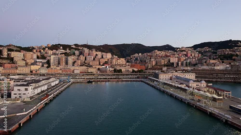 Panoramic view of port of Genoa on Mediterranean coast early morning, Genoa, Italy. Taken from hand