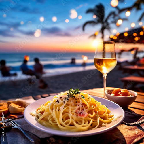 freshly made pasta carbonara on party background in blurred beach, evening
