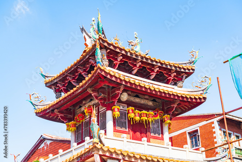 Roof sculpture of Tianhou Palace in Quanzhou, Fujian, China Ancient pagoda of Kaiyuan Temple in Quanzhou