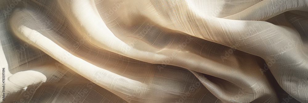 Beige silk fabric with texture and folds. Closeup of beige cloth material with delicate lines and waves, creating an elegant background for design or decoration Beige silk fabric with texture and folds. Closeup of beige cloth material with delicate lines and waves, creating an elegant background for design or decoration