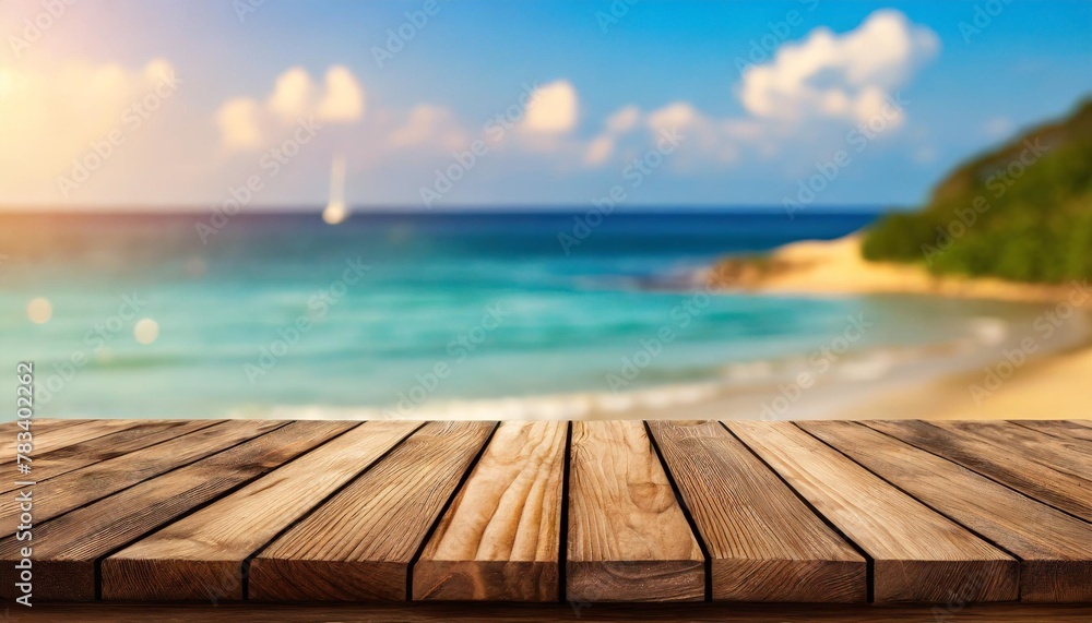 empty wooden table on blurred light and beach background