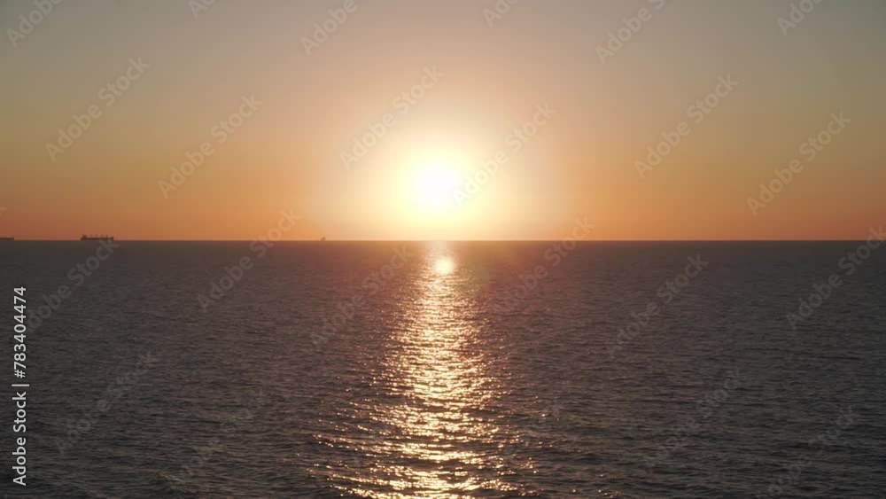 Beautiful sunset dawn on the sea. Sunrise sundown dawning. Rising of sun. Sun sunny sunshiny. Sea water waves, ripples on water. Sunny path, solar path. Natural background nature backdrop. Seascape Beautiful sunset dawn on the sea. Sunrise sundown dawning. Rising of sun. Sun sunny sunshiny. Sea water waves, ripples on water. Sunny path, solar path. Natural background nature backdrop. Seascape
