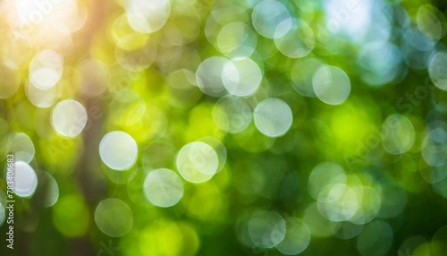 abstract background of light bokeh blur on green background