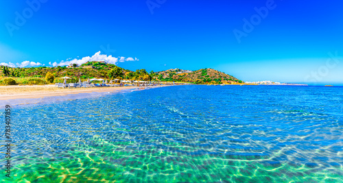 Almyros Beach, Crete, Greece: Nature landscape view of beautiful beach and sea in a sunny day close to Agios Nikolaos