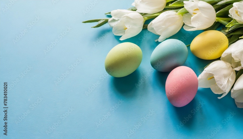 collection of stylish colors eggs with flowers for easter celebration on blue background