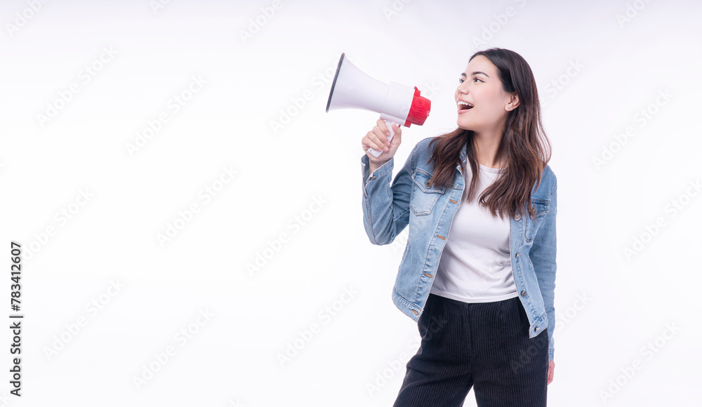 Excited asian mixed race woman denim jacket use megaphone announcement hot news sale copy space on isolated white background. Happy young girl shouting speaker shock sale advertisement empty attention Excited asian mixed race woman denim jacket use megaphone announcement hot news sale copy space on isolated white background. Happy young girl shouting speaker shock sale advertisement empty attention