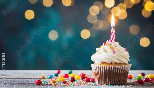 birthday cupcake with one candle