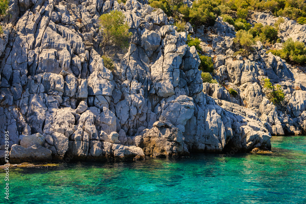 Texture rocky seashore. Background with selective focus and copy space