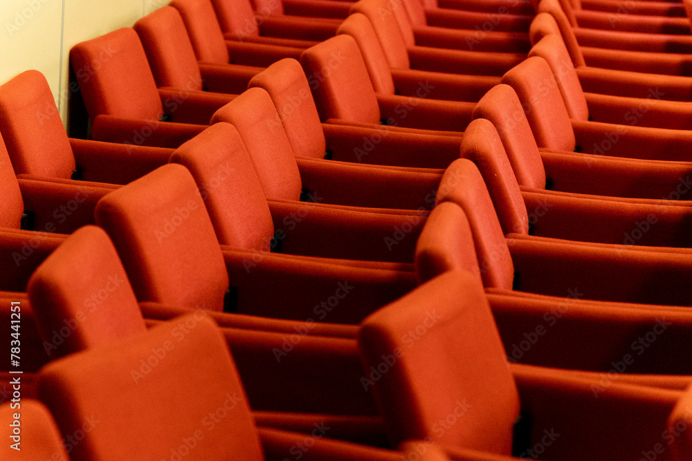 Obraz premium close rows of red armchairs in the conference room