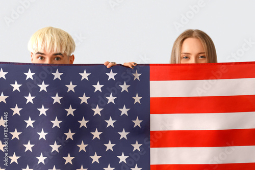 Young couple with USA flag ...