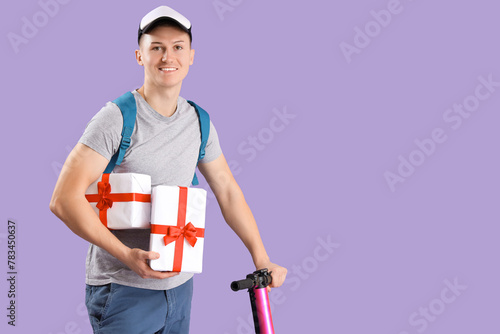 Male courier with gift boxe...