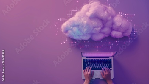 A person typing on laptop with cloud technology concept, purple background, top view © CNISAK