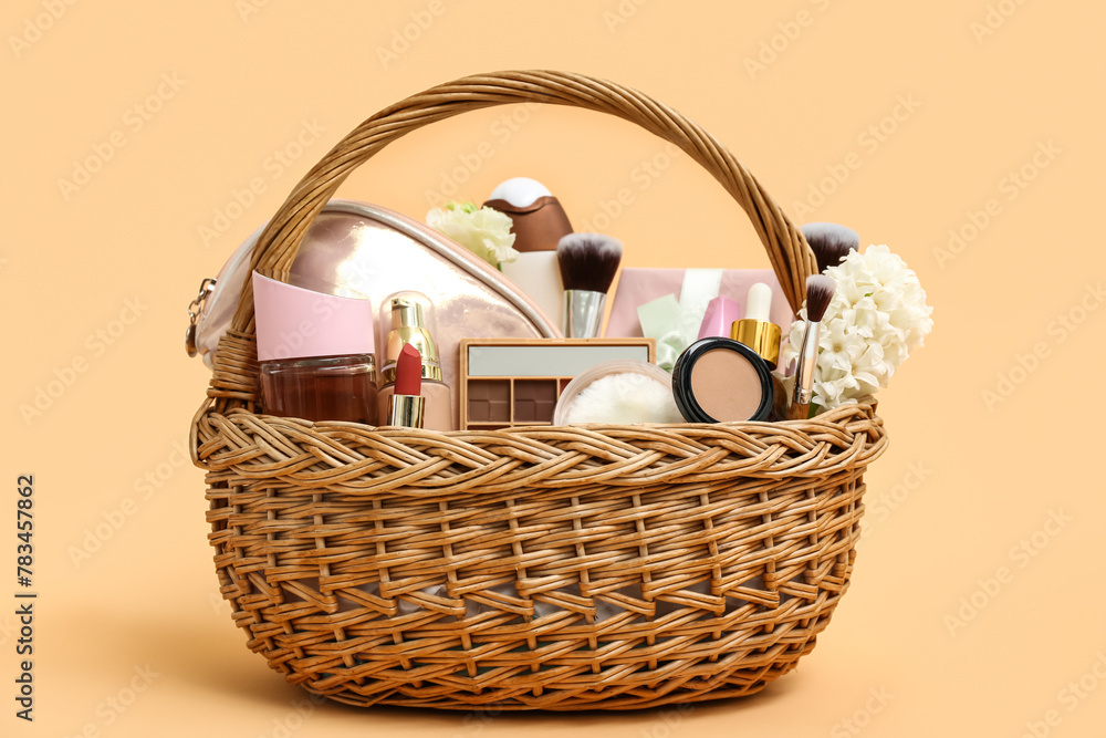 Gift basket with decorative cosmetics and flowers for Mother's Day celebration on color background - obrazy, fototapety, plakaty 