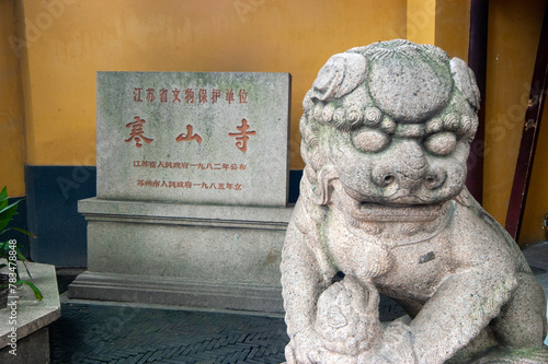 A stone lion in front of Hanshan Temple in Suzhou, Jiangsu province, China