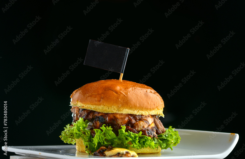 Beef Pilz Burger; Beef patty, Mushroom, DemiGlace Sauce, lettuce