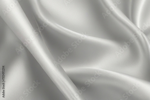 luxury cloth with drapery and wavy folds of ivory color creased smooth silk satin material texture. photo