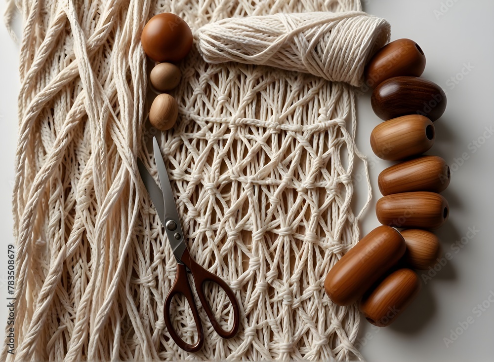 Weaving macrame. Materials for macrame. White and brown threads, wooden beads, scissors. Close-up on a white background
Weaving macrame. Materials for macrame. White and brown threads, wooden beads, scissors. Close-up on a white background