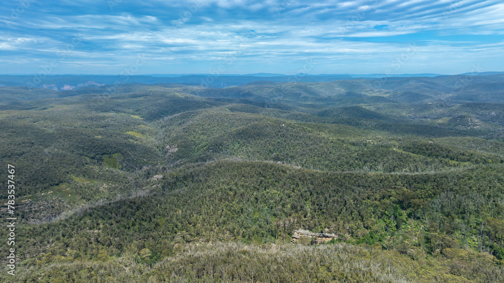 Naklejka premium Drone aerial photograph of a large hilly valley full of lush foliage near Mount Wilson in the Blue Mountains in New South Wales in Australia