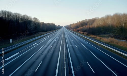 An empty highway or autobahn with no cars on the road, depicting a driving ban scenario photo