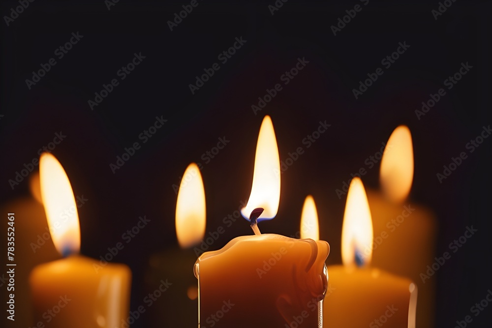 Candles ablaze casting a warm glow, wax slowly melting against a pitch black backdrop. Candles ablaze casting a warm glow, wax slowly melting against a pitch black backdrop.