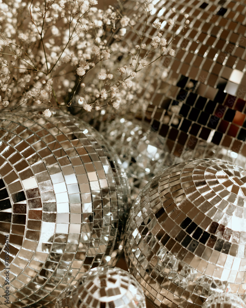 Retro discoballs with babys breath as decor