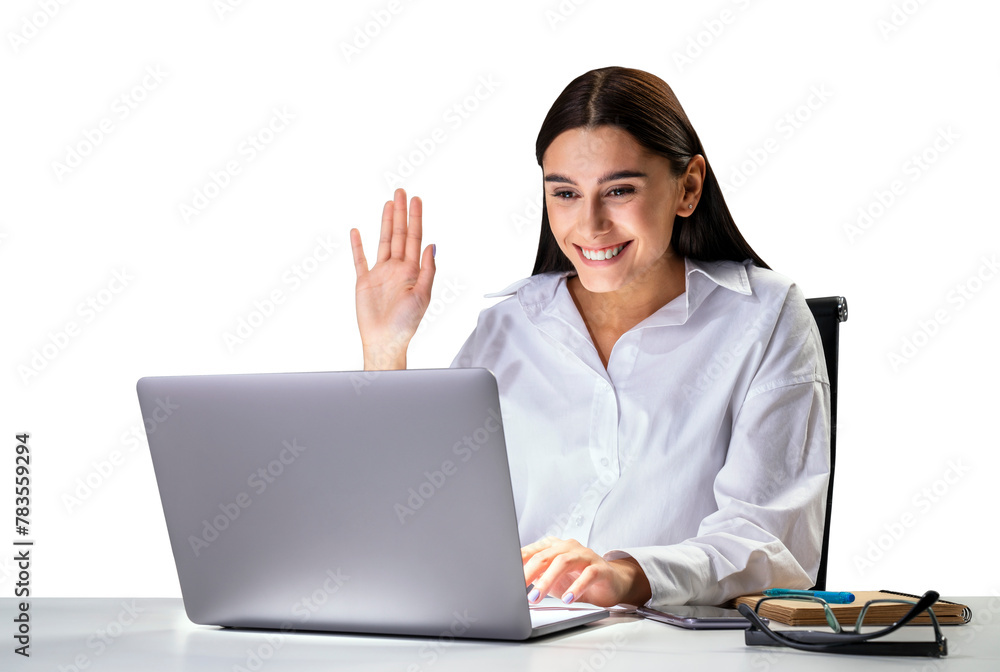 Smiling businesswoman at her desk, waving while using a laptop, isolated on a white background, concept of online work Smiling businesswoman at her desk, waving while using a laptop, isolated on a white background, concept of online work