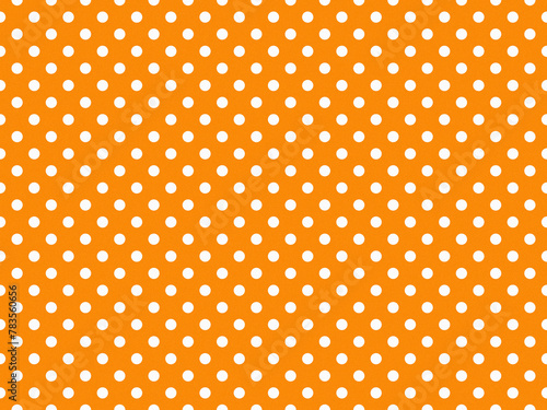 texturised white color polka dots over dark orange background