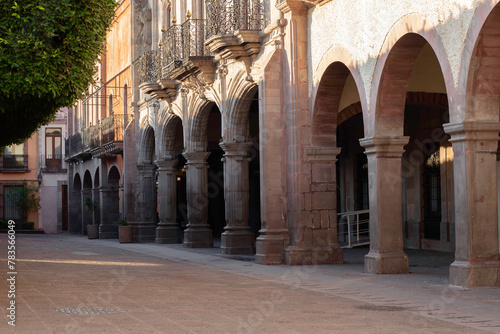 places in the historic center of Queretaro  where we can find beautiful arches supported by wonderful columns  a fountain  and even a hotel with a church in the background
