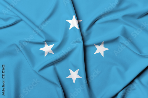 Beautifully waving and striped Micronesia flag, flag background texture with vibrant colors and fabric background