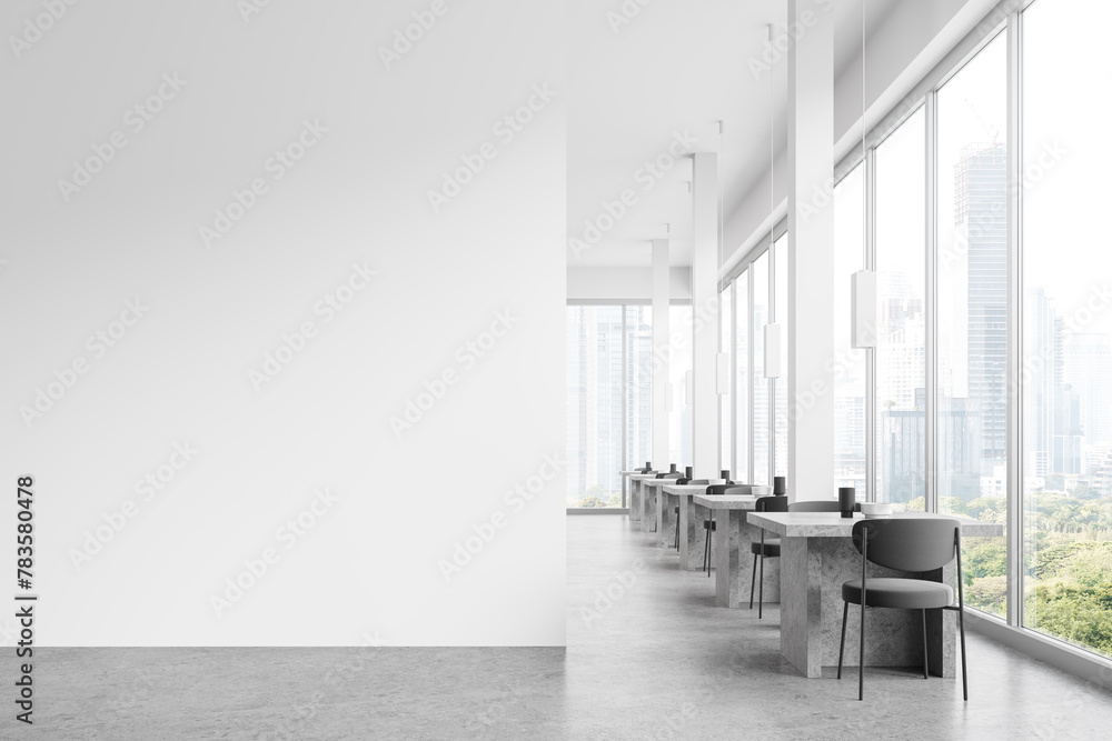 Naklejka premium White restaurant interior with seats and tables in row near window. Mockup wall