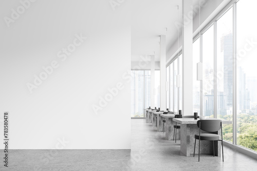 White restaurant interior with seats and tables in row near window. Mockup wall photo