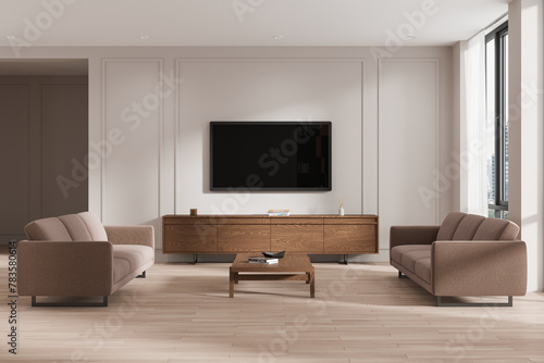 Vászonkép Modern living room interior with a mounted TV screen on the wall, couches, wooden furniture, and herringbone floor, concept of minimalism
