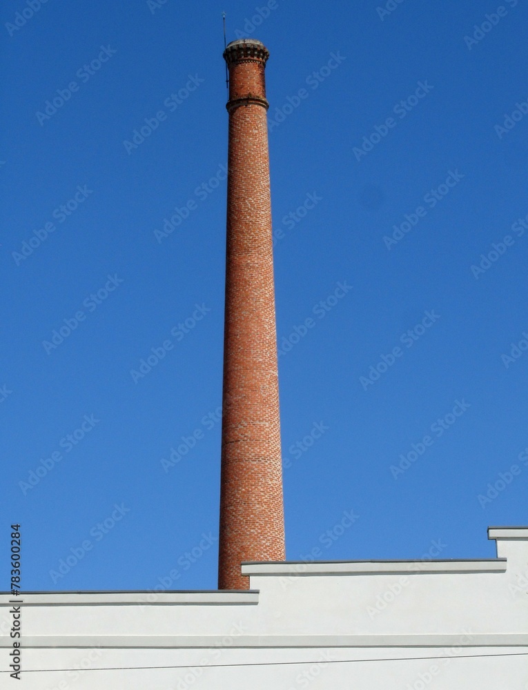 Old factory chimney with blue sky 