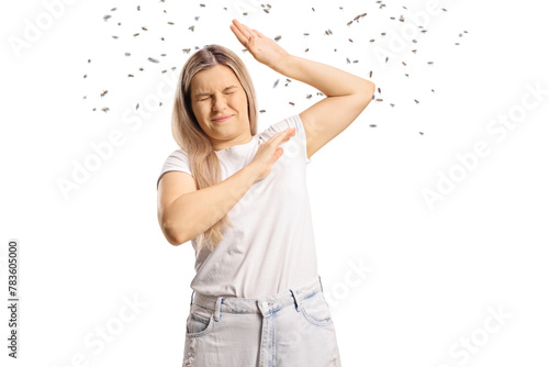 Swarm of bees attacking a young woman