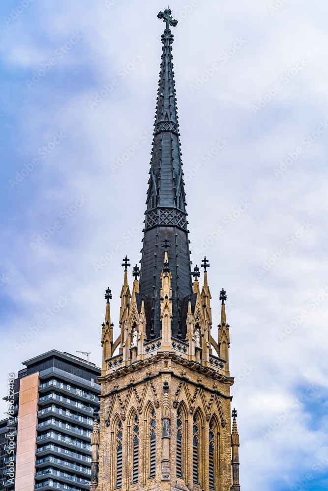 Vertical shot of the top of a historical church in Toronto, Canada Vertical shot of the top of a historical church in Toronto, Canada