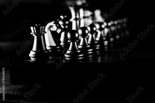 Closeup of chess pieces on chess board