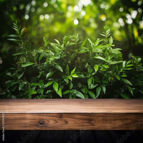 wooden table top over blurry garden background photo in sepia tone