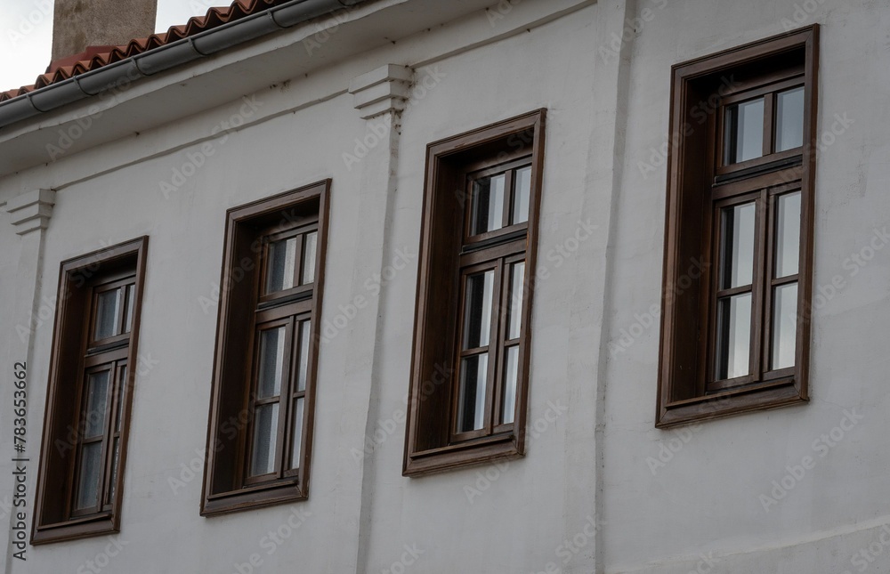 Windows with frames on the facade of an old Macedonian house
