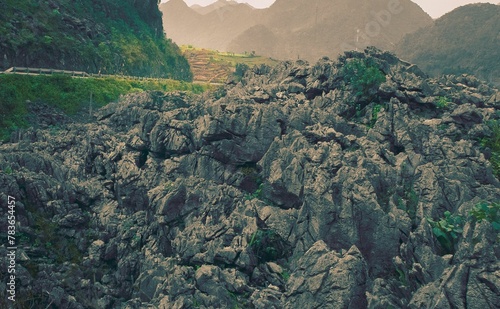 Rocky hill among the steep mountains in the north of Vietnam photo