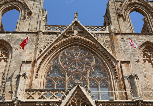 Close up of The Lala Mustafa Pasha Mosque with Turkish and Northern Cyprus Flags in Famagusta, North Cyprus