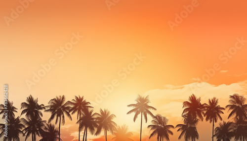 A beautiful sunset over the ocean with palm trees in the background