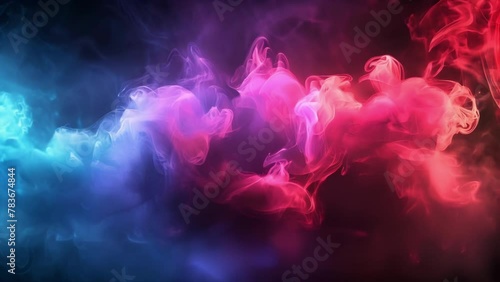 Pulsating waves of vividly colored smoke create an otherworldly atmosphere against the dark background. photo
