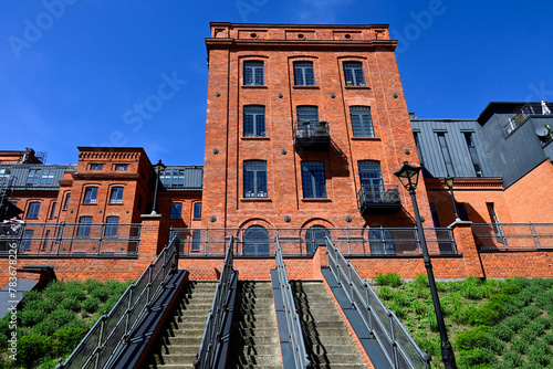 Lodz, Łódź, Poland, Europe - historic huge spinning mill factory built in 1872, after revitalization it houses modern loft apartments, Ksiezy Mlyn, tymienieckiego street