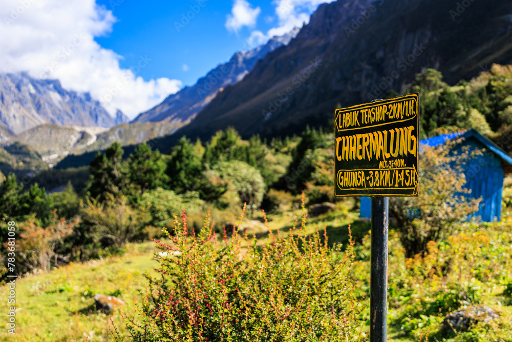 Signpost at Chhermalung (3,740m) on the Kanchenjunga Base Camp trek (and the Great Himalaya trail (GHT)) between the settlements of Ghunsa and Khambachen, Himalaya in Nepal.