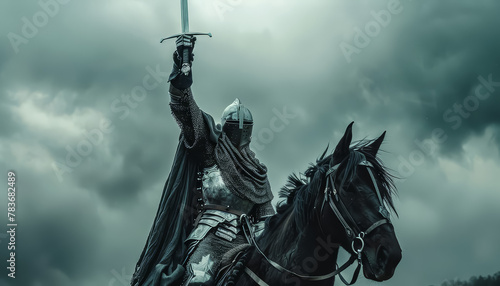 A knight on horseback is wearing a suit of armor and holding a sword photo