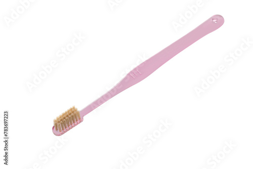 Pink toothbrush on white background