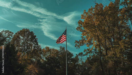 A large American flag is flying high in the sky © terra.incognita