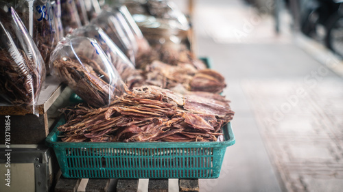 Dried squid for sale at the Ban Na Kluea seafood market, Thailand. photo