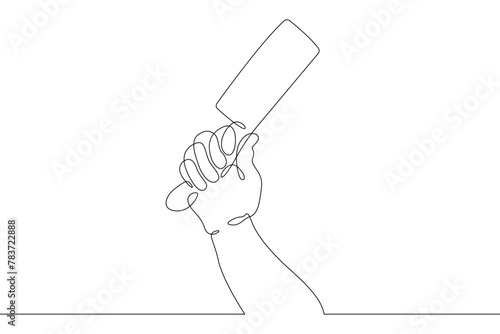 Hand with a knife. The cook is holding a knife in the kitchen. Cooking, cutting food with a metal knife.One continuous line drawing. Line Art isolated white background.