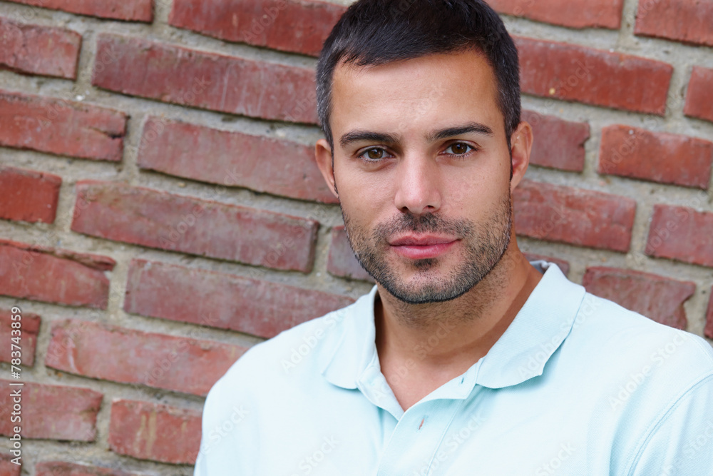 Casual, man and portrait with brick wall in confidence outside with face for closeup city. Smile, pride and informal in town with headshot for content with person, sidewalk and street with happy Casual, man and portrait with brick wall in confidence outside with face for closeup city. Smile, pride and informal in town with headshot for content with person, sidewalk and street with happy